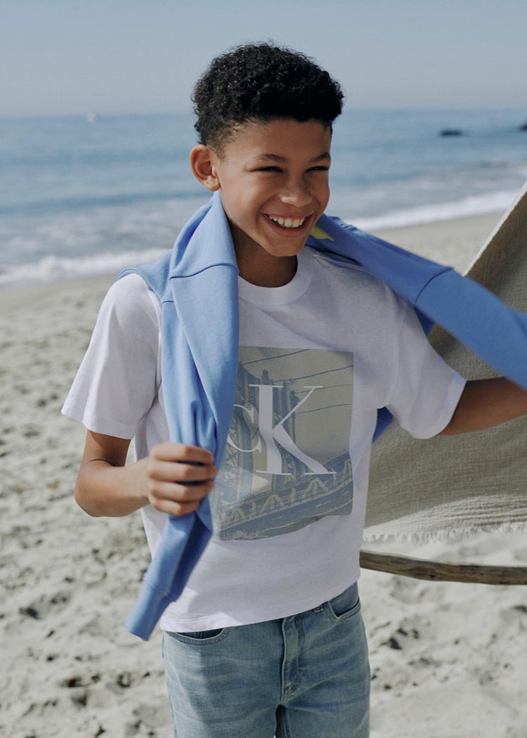Boy posing on the beach